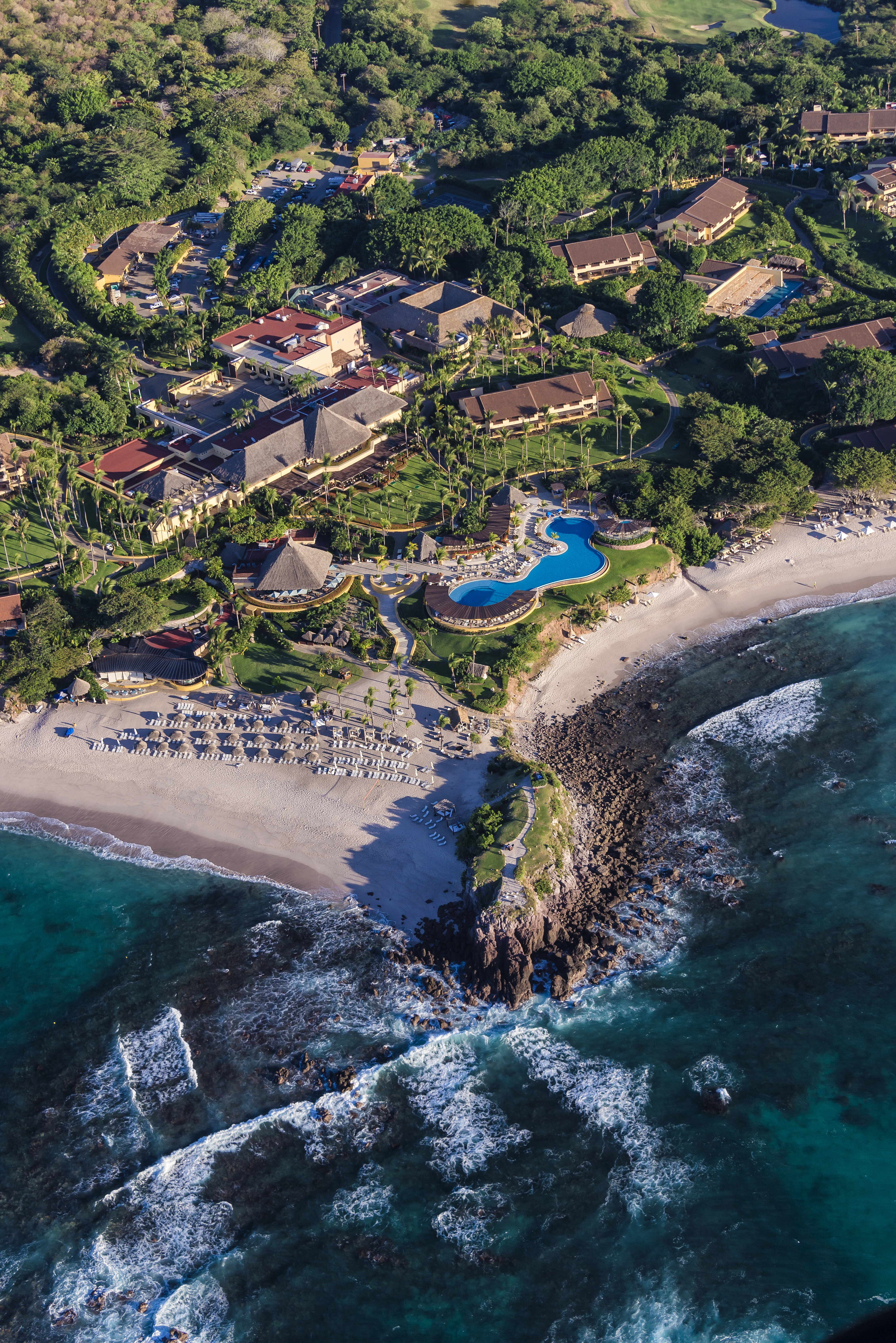Aerial view of a luxury beachfront resort in Mexico