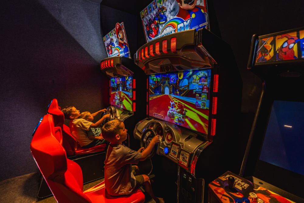 The high-end game room and arcade at Bella Vila, featuring bowling and entertainment for families seeking the best villas for holidays in Punta Mita.