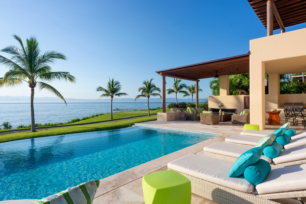Beachfront luxury villa in Punta Mita offering proximity to golf courses and premium beach club access.